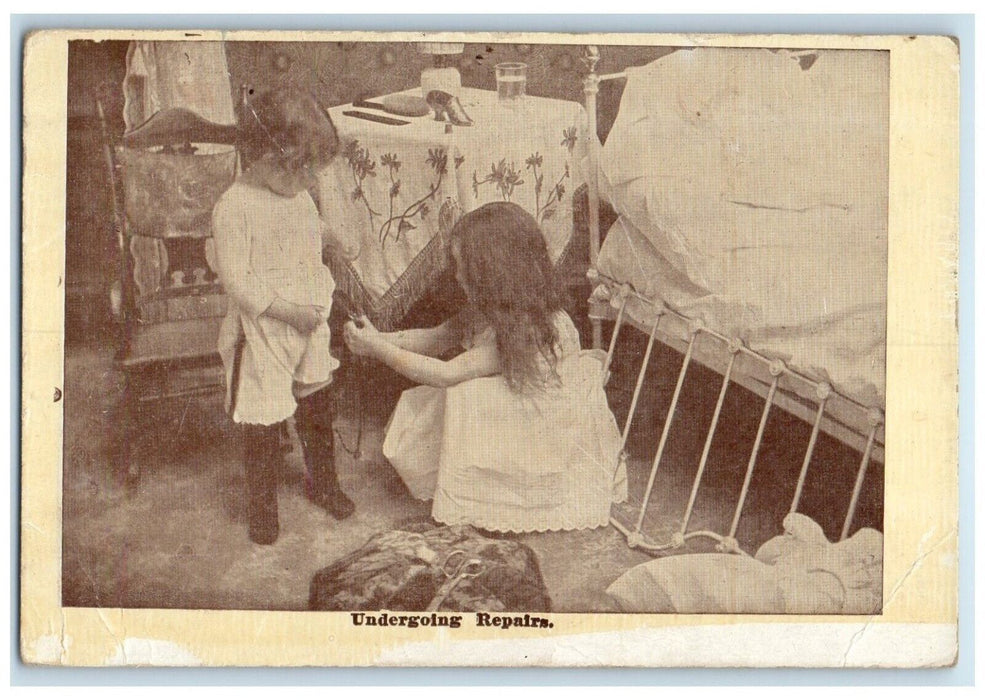 1916 Sewing Baby Clothes Undergoing Repairs Canada Posted Antique Postcard