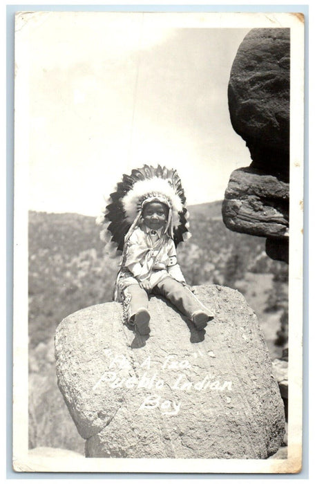 c1930's Pueblo Indian Boy Sat On The Rock RPPC Photo Unposted Vintage Postcard
