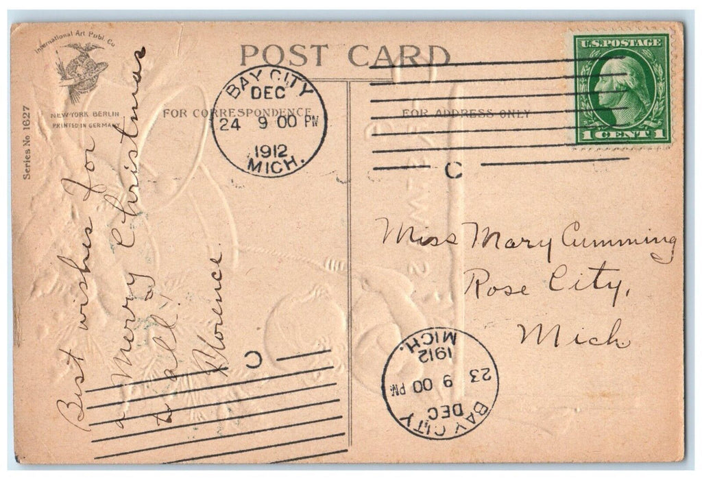 1912 Christmas Girl Ringing Bells House Winter Clapsaddle Bay City MI Postcard