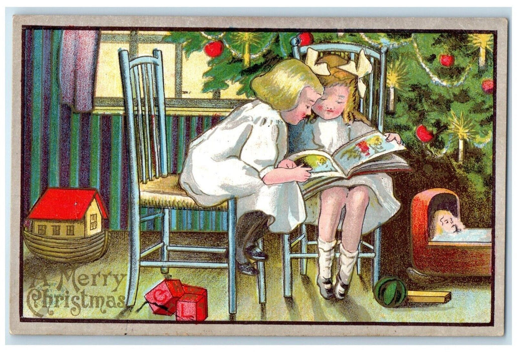 c1910's Christmas Children Reading Book Playing Doll Cubes Embossed Postcard
