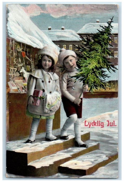 1910 Christmas Children Holding Pine Tree Winter Scene Posted Antique Postcard
