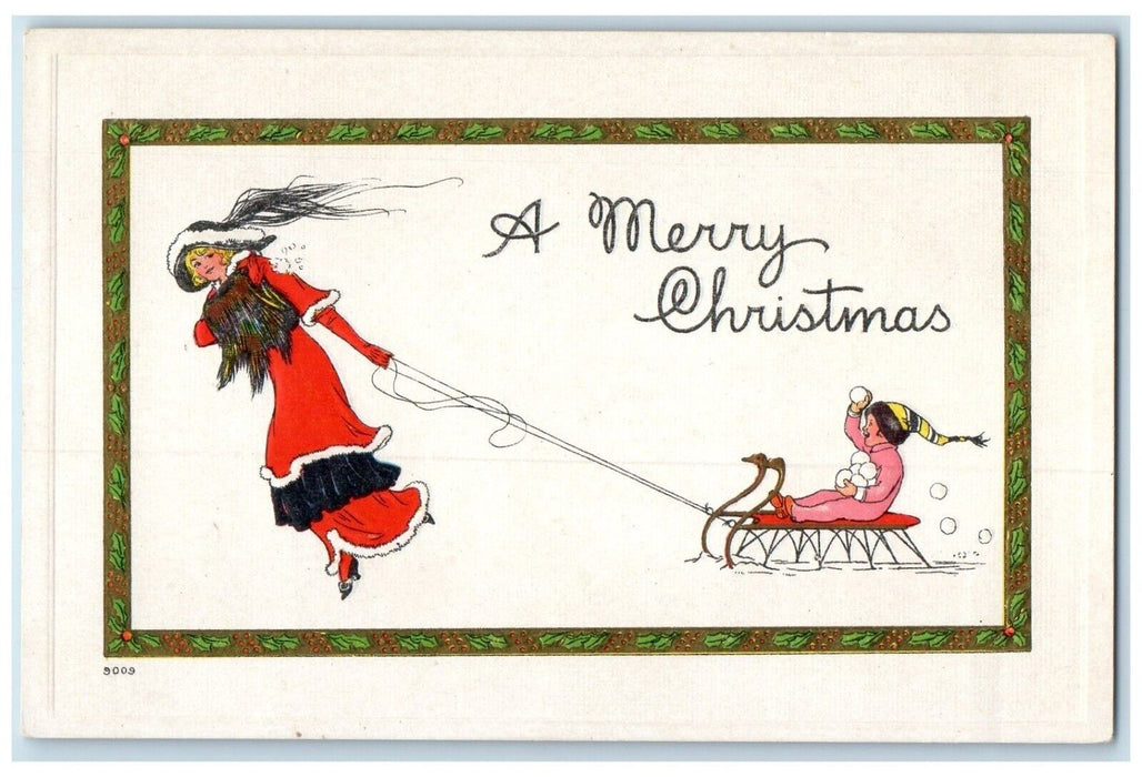 c1910's Christmas Woman Pulling Cart Snowball Winter Embossed Antique Postcard