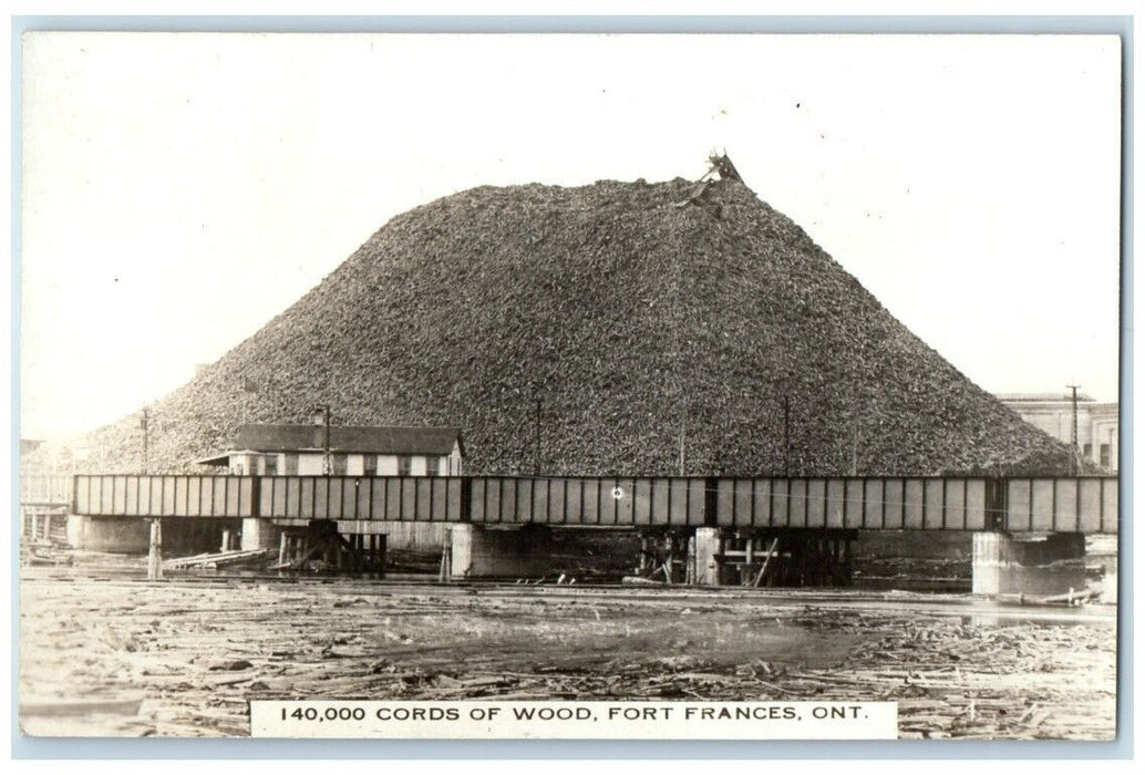 c1920's Large Woodpile Cords Of Wood Fort Frances Ontario RPPC Photo Postcard