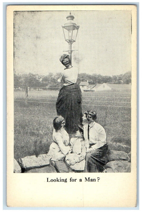 c1910's Woman Climbing Street Light Looking At Man Unposted Antique Postcard