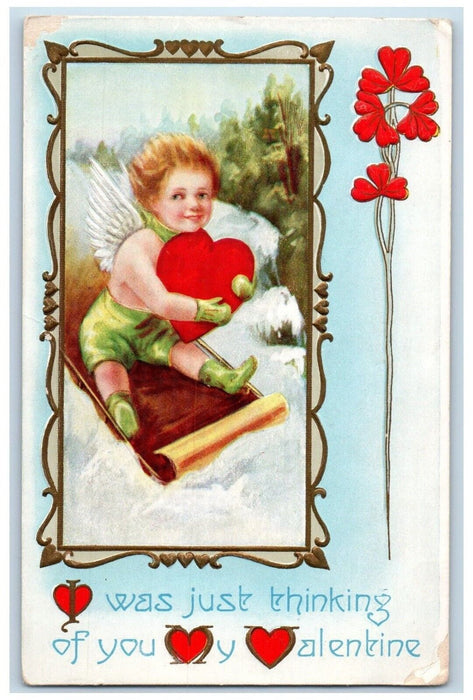 c1910's Valentine Angel Heart Sled Winter Snow Embossed Antique Postcard