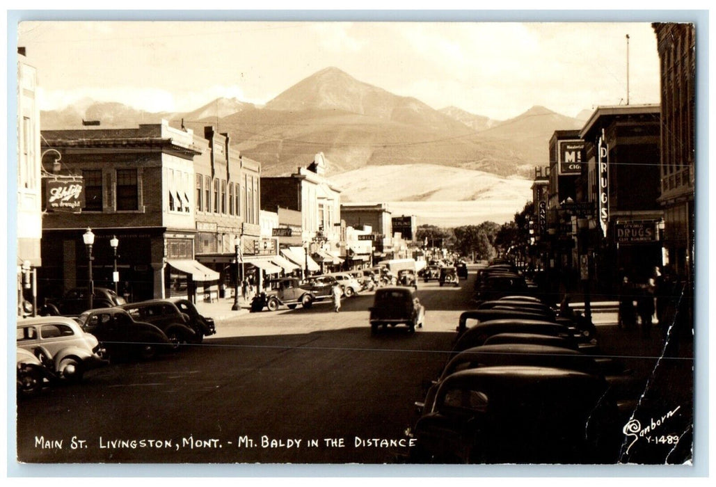 1945 Main St. Livingston Montana, Mt. Baldy Cars Drugs Store RPPC Photo Postcard