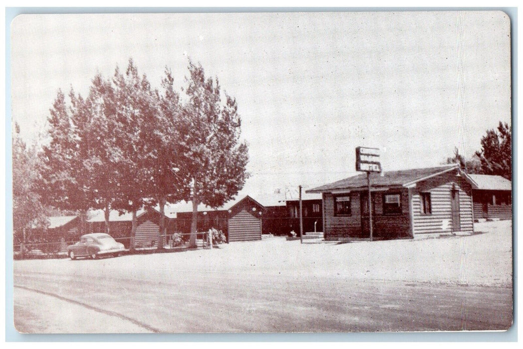 c1940 Covered Wagon Motel Yellowstone Park West Cody Wyoming WY Vintage Postcard