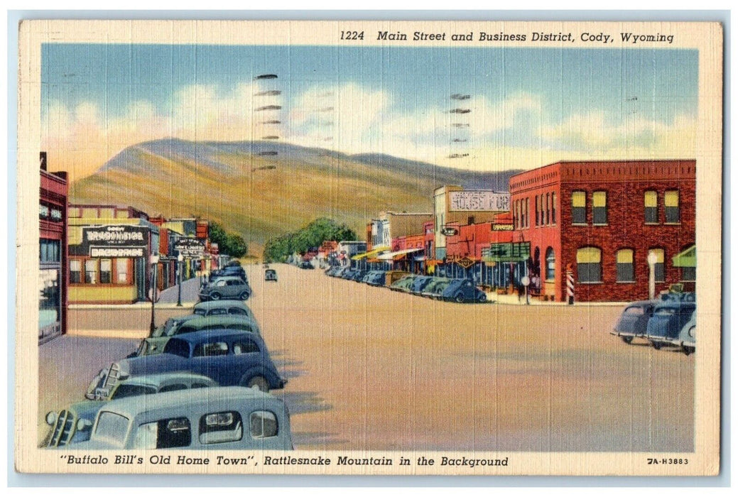 1946 Main Street And Business Cars Stores District Cody Wyoming WY Postcard