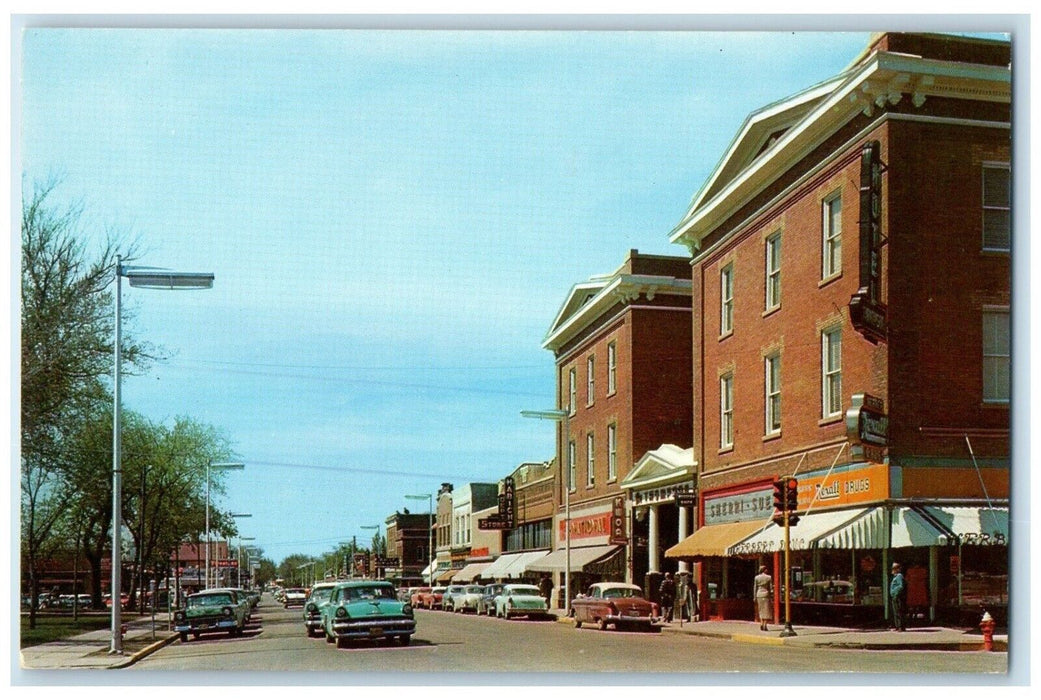 c1960 Tenth St. Looking West Exterior Building Worthington Minnesota MN Postcard