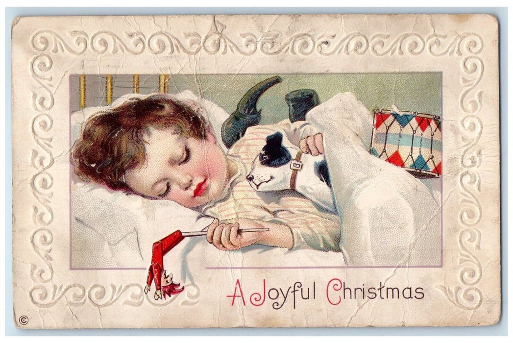 1913 Christmas Child Sleeping With Toys Dog Embossed New York NY Posted Postcard