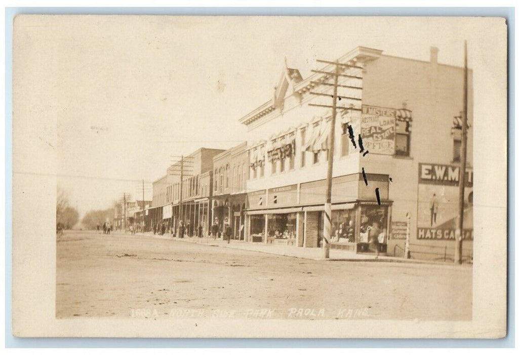 1910 North Side Park Street Business View Paola Kansas KS RPPC Photo Postcard