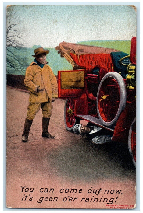 1909 Man Fixing Car Its Green O'er Raining Bamforth Means Ohio OH Postcard