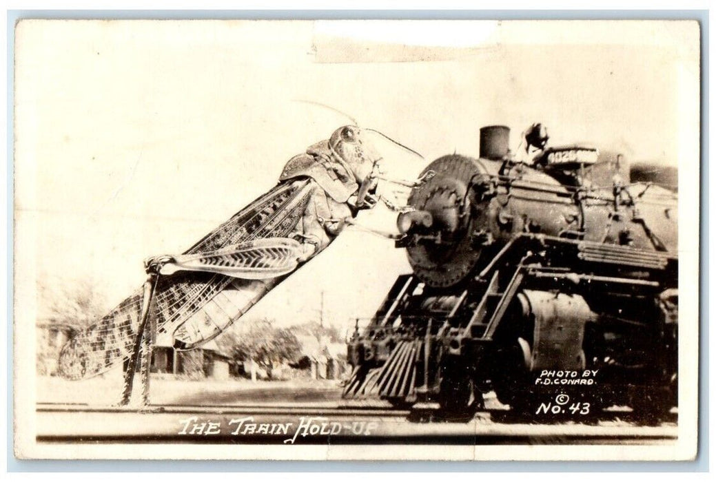 c1940's F.D. Conrad Exaggerated Grasshopper Train Hold Up  RPPC Photo Postcard