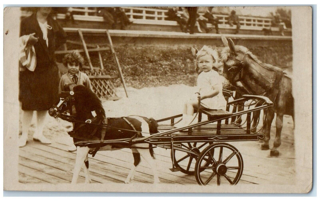 Cute Toddler Riding Horse Wagon England United Kingdom RPPC Photo Postcard