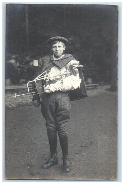 c1910 Young Boy Lad Cap Injured Arm Medical Device England RPPC Photo Postcard