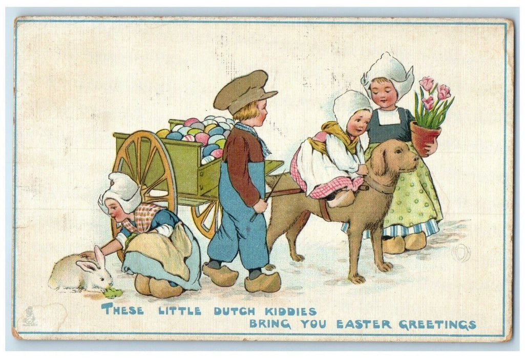 1915 Easter Greetings Dutch Kids Rabbit Dog Pulling Wagon Tuck's Posted Postcard