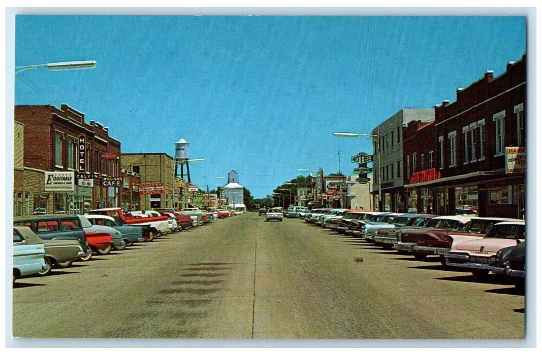 c1950's Main Street Kit Carson County Cars Hotel Motel Burlington CO Postcard