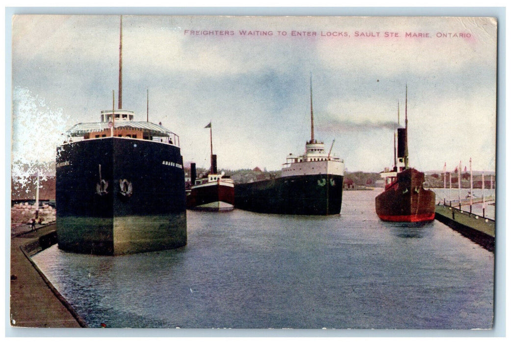 c1910 Freighters Waiting to Enter Locks Sault Ste Marie Ontario Canada Postcard