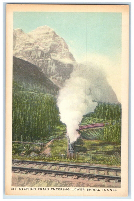 Mt. Stephen Train Entering Lower Spiral Tunnel Railroad Train Canada Postcard