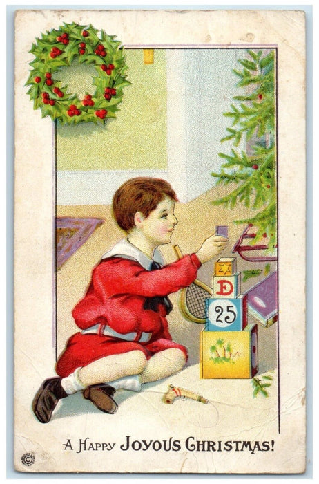 1918 Christmas Boy Playing Blocks Badminton Embossed Columbus Ohio OH Postcard