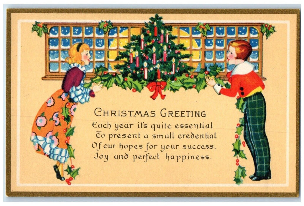 c1910's Christmas Greetings Boy Girl Decorating Christmas Tree Antique Postcard