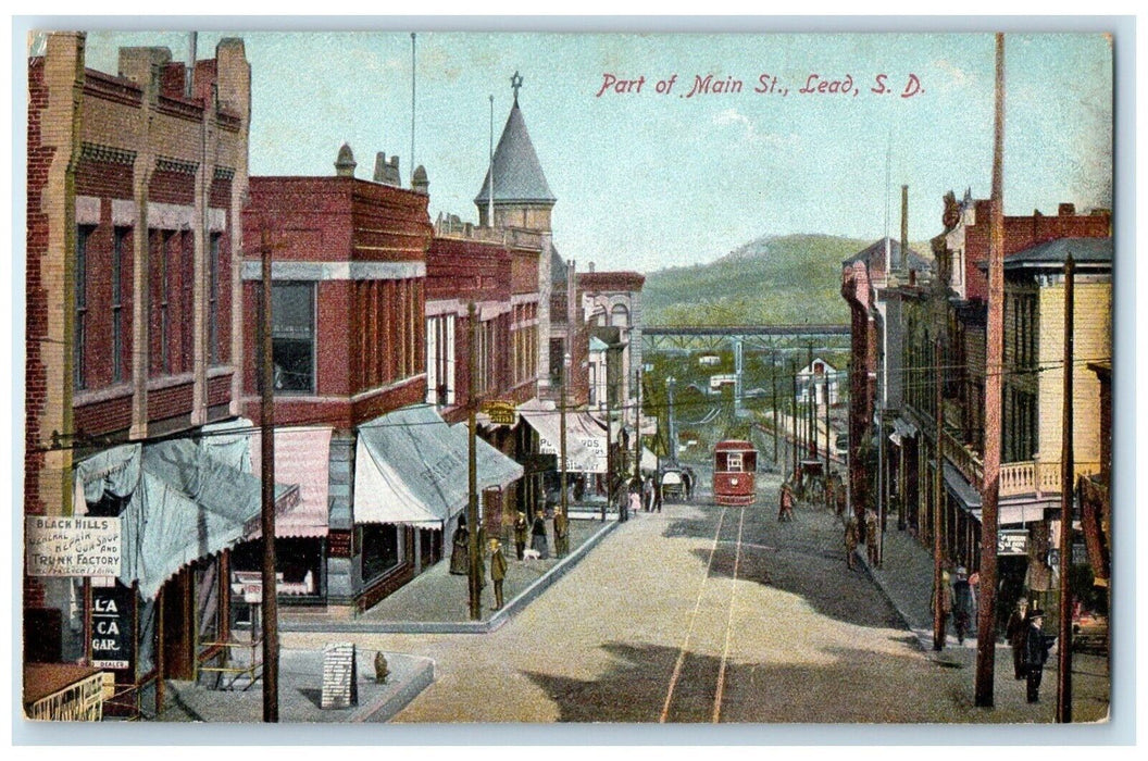 c1910 Part Main St. Exterior Building Streetcar Road Lead South Dakota Postcard