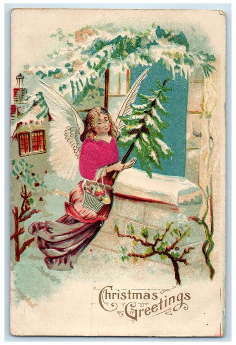 1908 Christmas Greetings Angel With Pine Tree On Window Oelwein IA Postcard