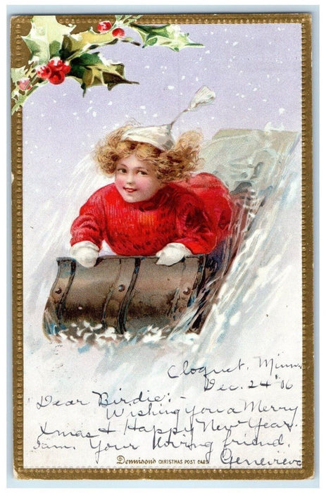 1906 Christmas Girl Sledding Holly Berries Winter Scene Brookston MN Postcard