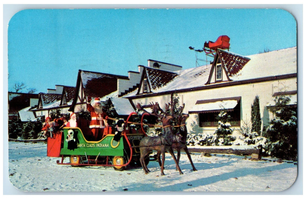 1951 Jolly Old Santa Sleigh Reindeer Scene Santa Claus Land Indiana IN Postcard