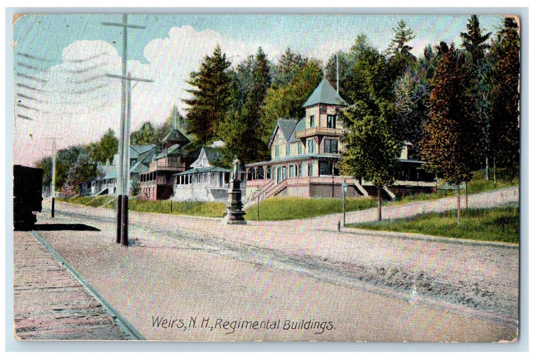 1909 Regimental Buildings Dirt Road Railroad Lamp Statue Trees Weirs NH Postcard