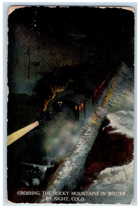 c1950 Crossing The Rocky Mountains Winter Night Train Light Colorado CO Postcard