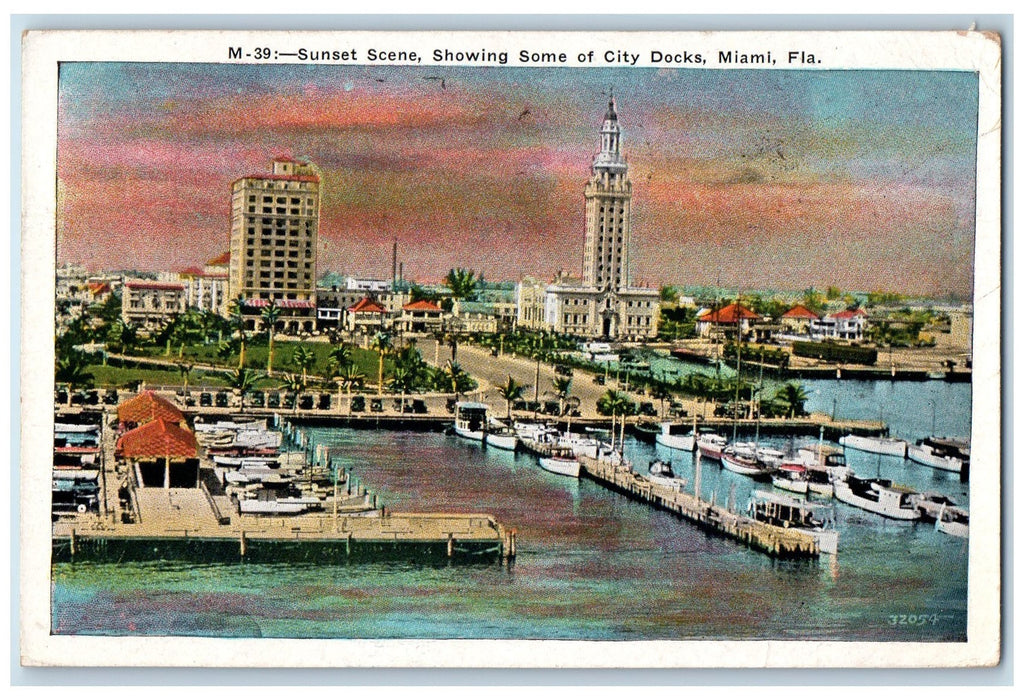 1933 Sunset Scene Showing City Of Docks Boats Buildings Tower Miami FL Postcard