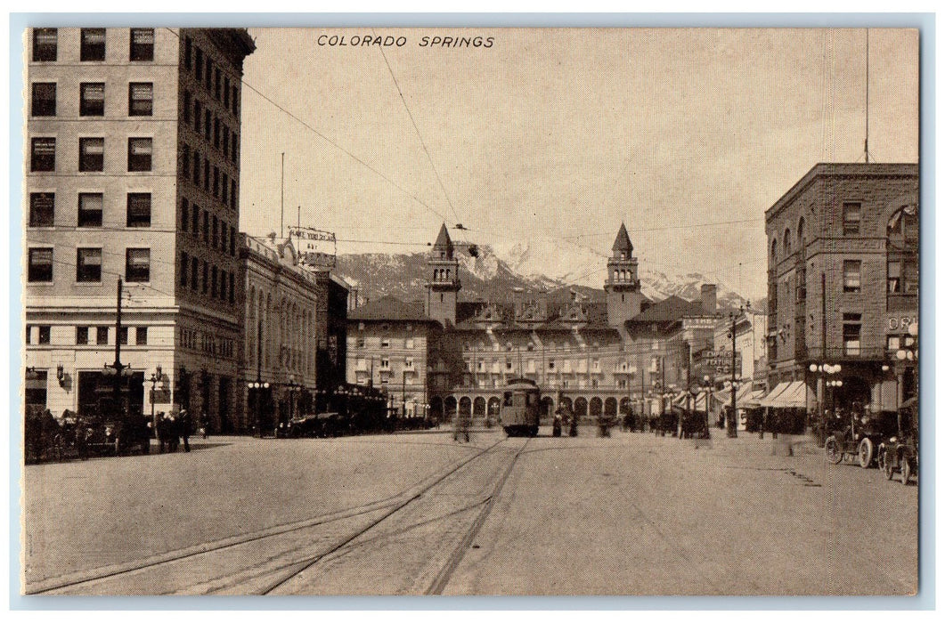 c1910 Colorado Springs Buildings Tower Classic Cars Railroad Trolley CO Postcard