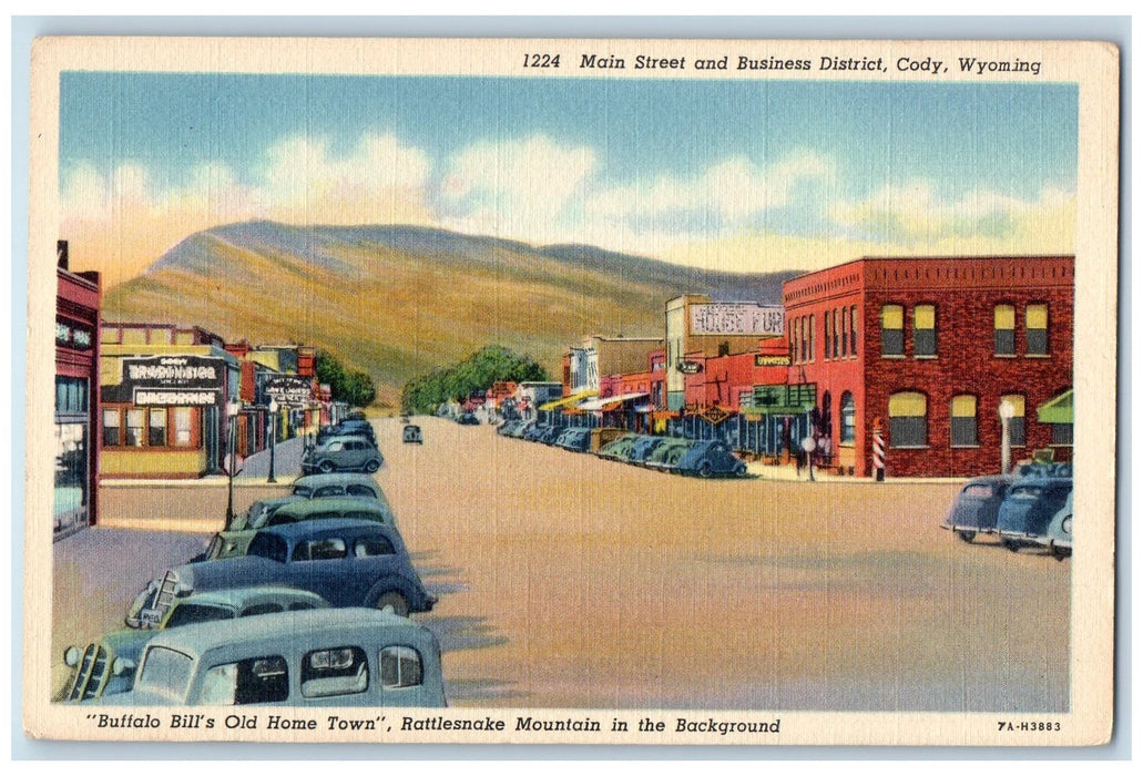 c1940's Main Street And Business District Cars Scene Cody Wyoming WY Postcard