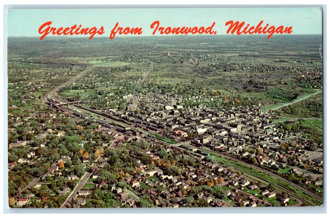 1972 Greetings From Ironwood Bird's Eye View Roads Building Michigan MI Postcard