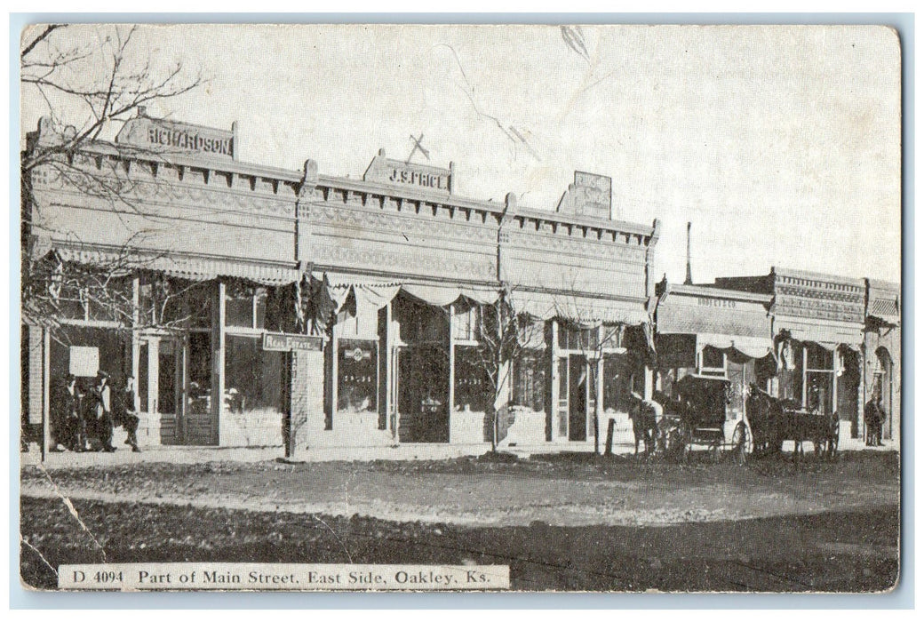 1910 Part Of Main Street East Side Exterior Oakley Kansas KS Carriages Postcard
