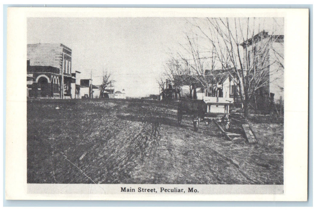 c1920 Main Street Dirt Road Wagon Houses Building Peculiar Missouri MO Postcard