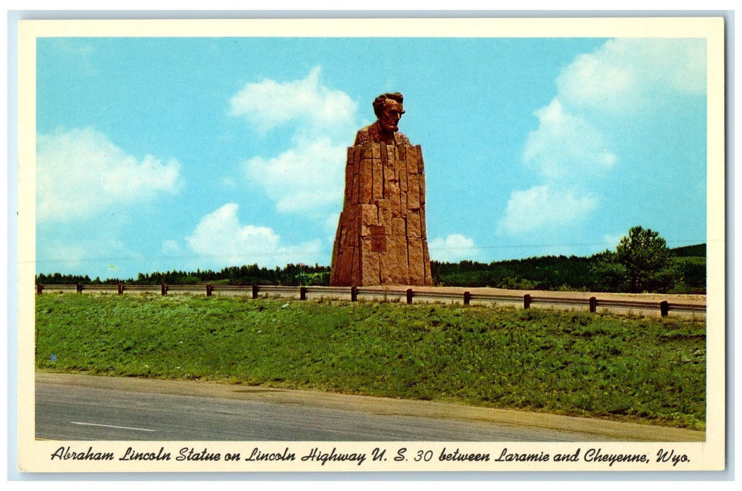c1960's Abraham Lincoln Statue Scene Highway Clouds Cheyenne Wyoming WY Postcard