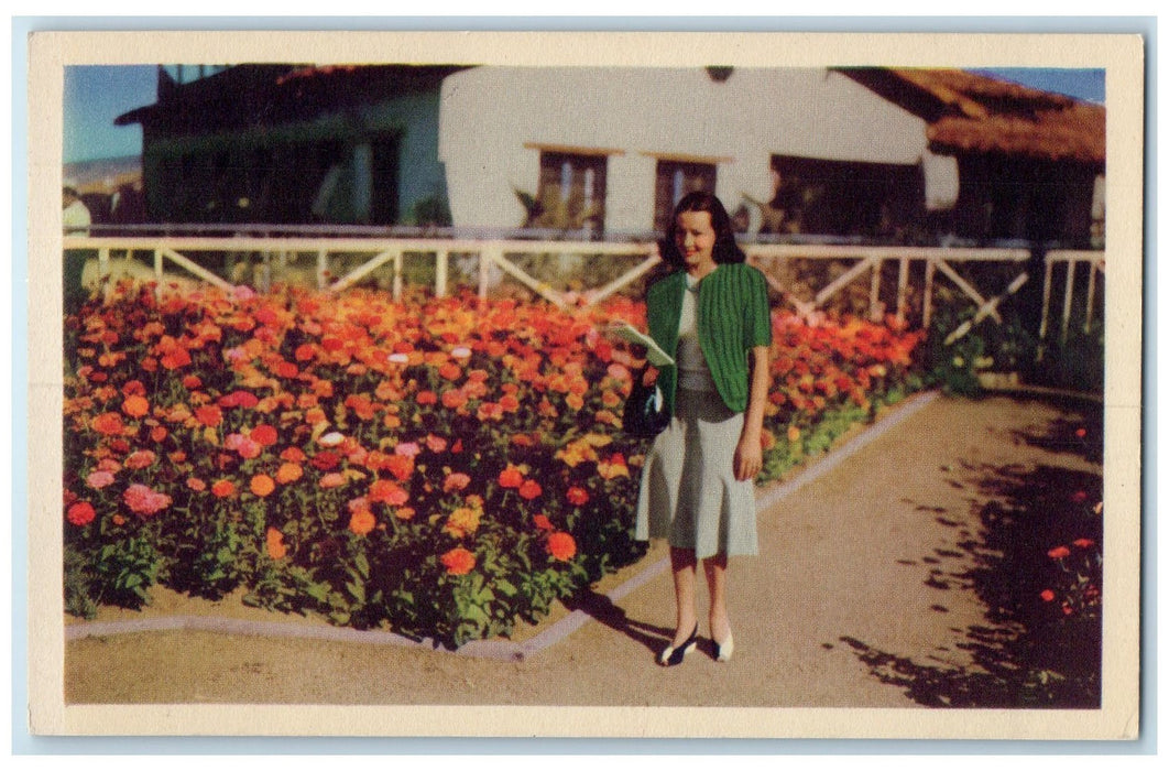 c1960's Del Mar Turf Club Woman Standing Flowers Del Mar California CA Postcard