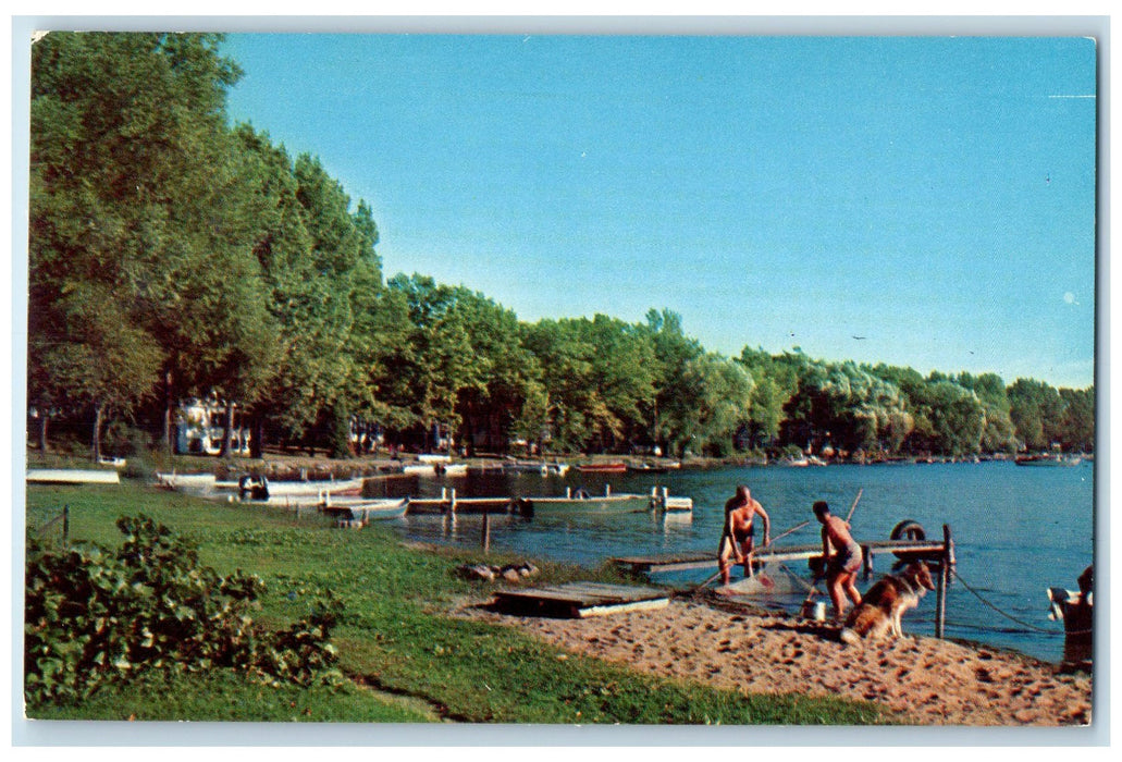 c1950's On The Shores Of Scenic Fishing Dog Boats Gull Lake Michigan MI Postcard