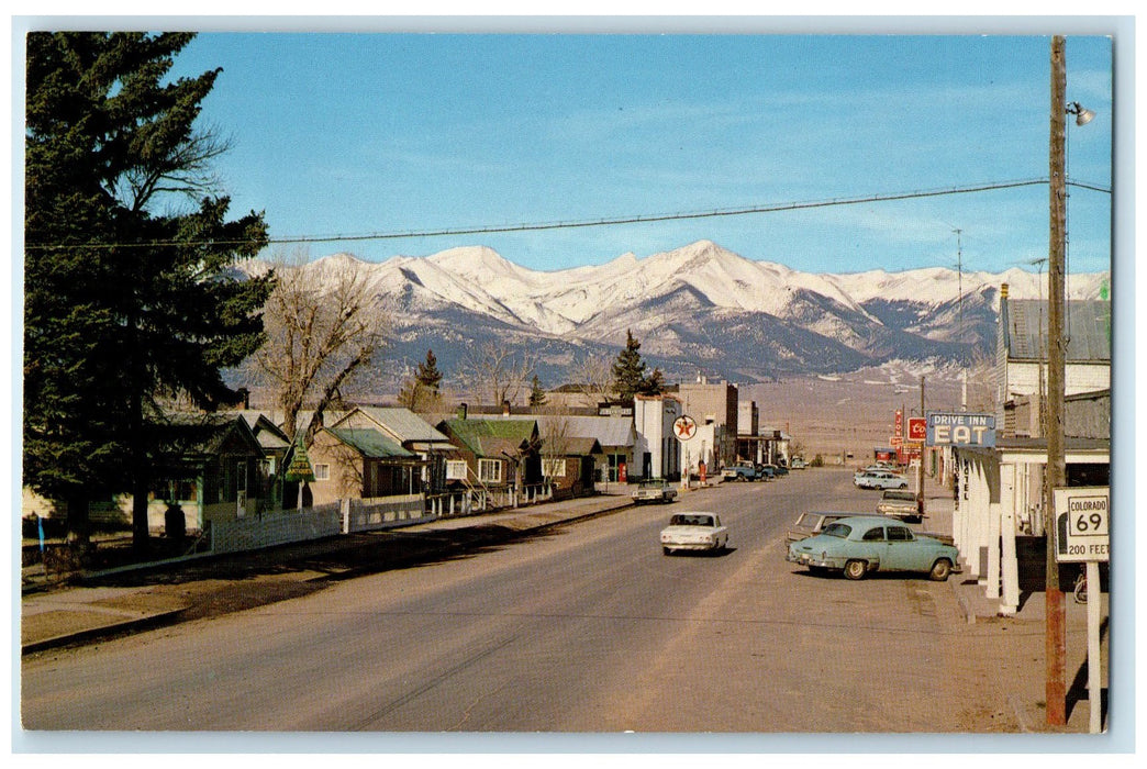c1950 Main Street Snow Clad Sangre DeCristo Mt. Westcliffe Colorado CO Postcard