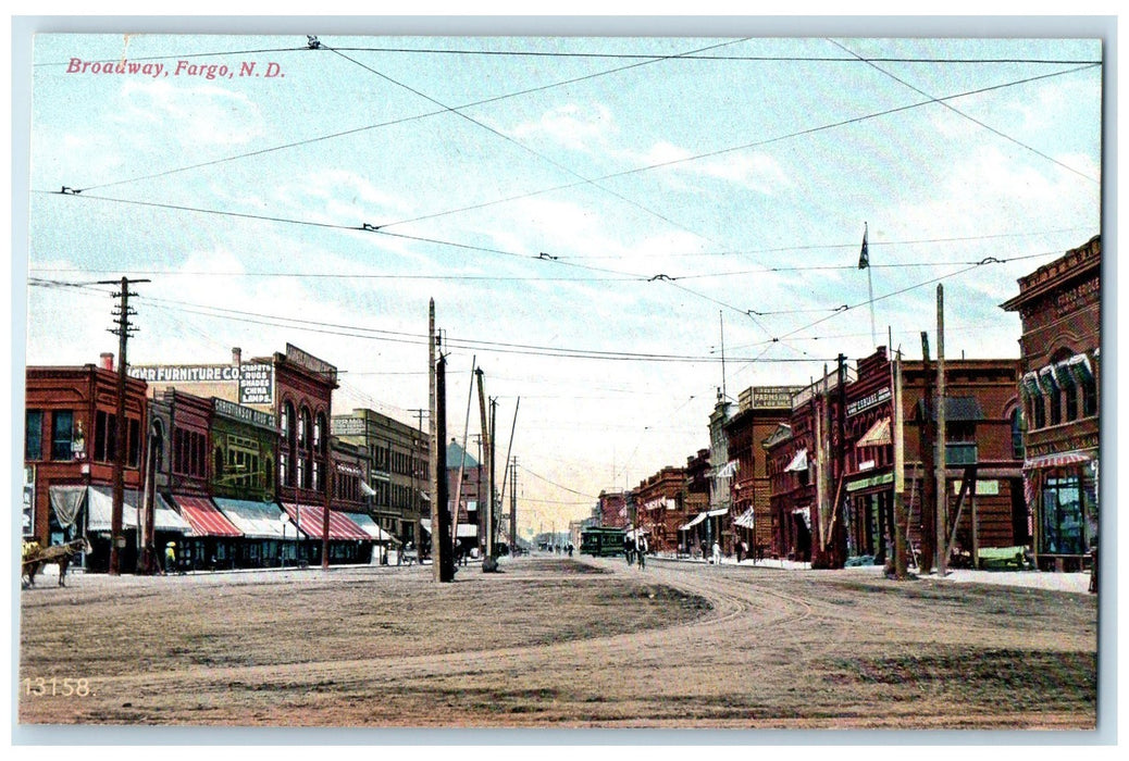 c1910 Broadway Dirt Road Ridin Bicycle Establishment Fargo North Dakota Postcard