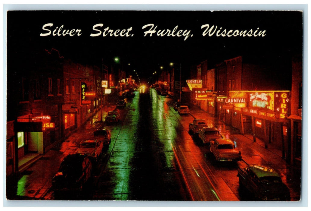 c1950's Silver Street At Night Classic Cars Pub Bars Hurley Wisconsin Postcard